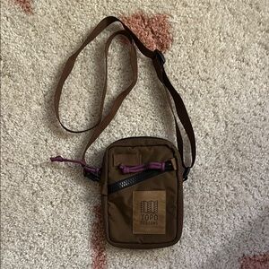 Topo Designs Mini Shoulder Bag. Color: Brown.